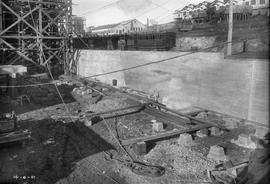 Construction of retaining wall below train line at E.Z. Co Zinc Works