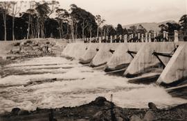 Water flows through dam spillway