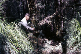Bushwalker repairs boots